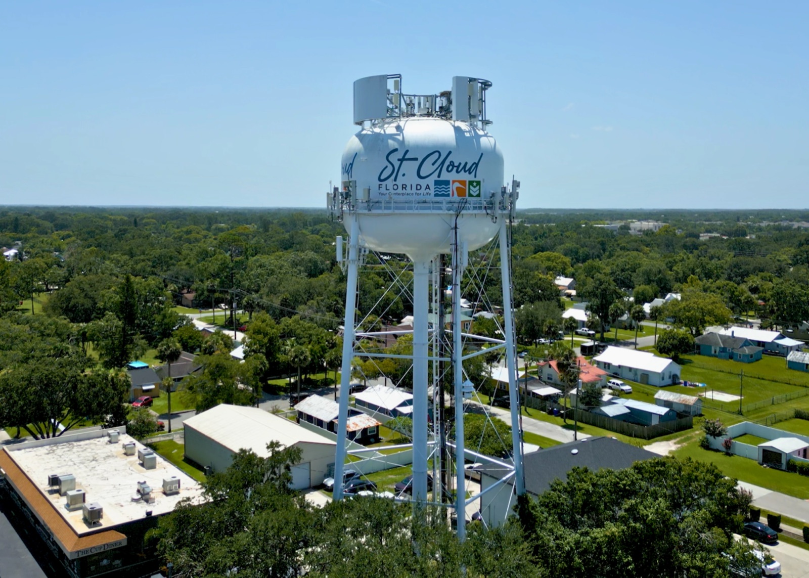 The St. Cloud, Florida water tower above tree-lined neighborhoods